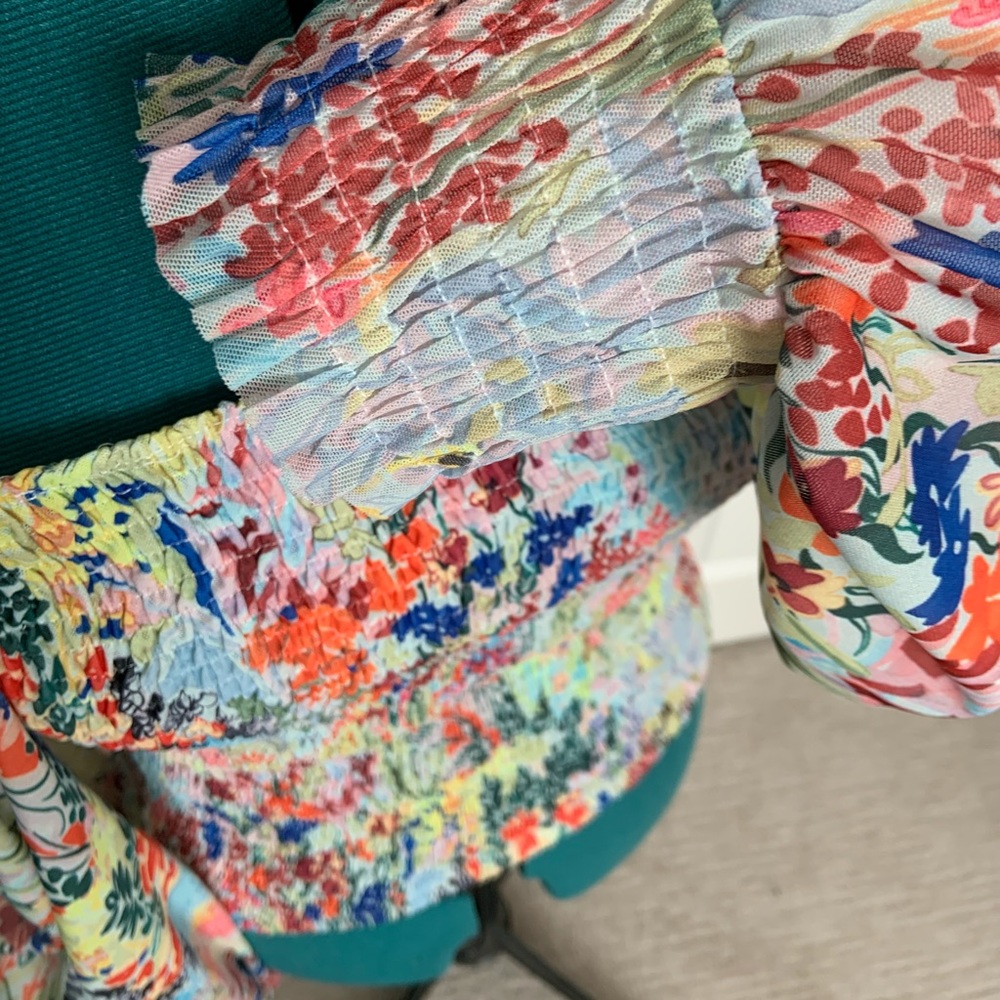 Anthropologie blouse with smocking through bodice, sleeves w/smocking wrists.